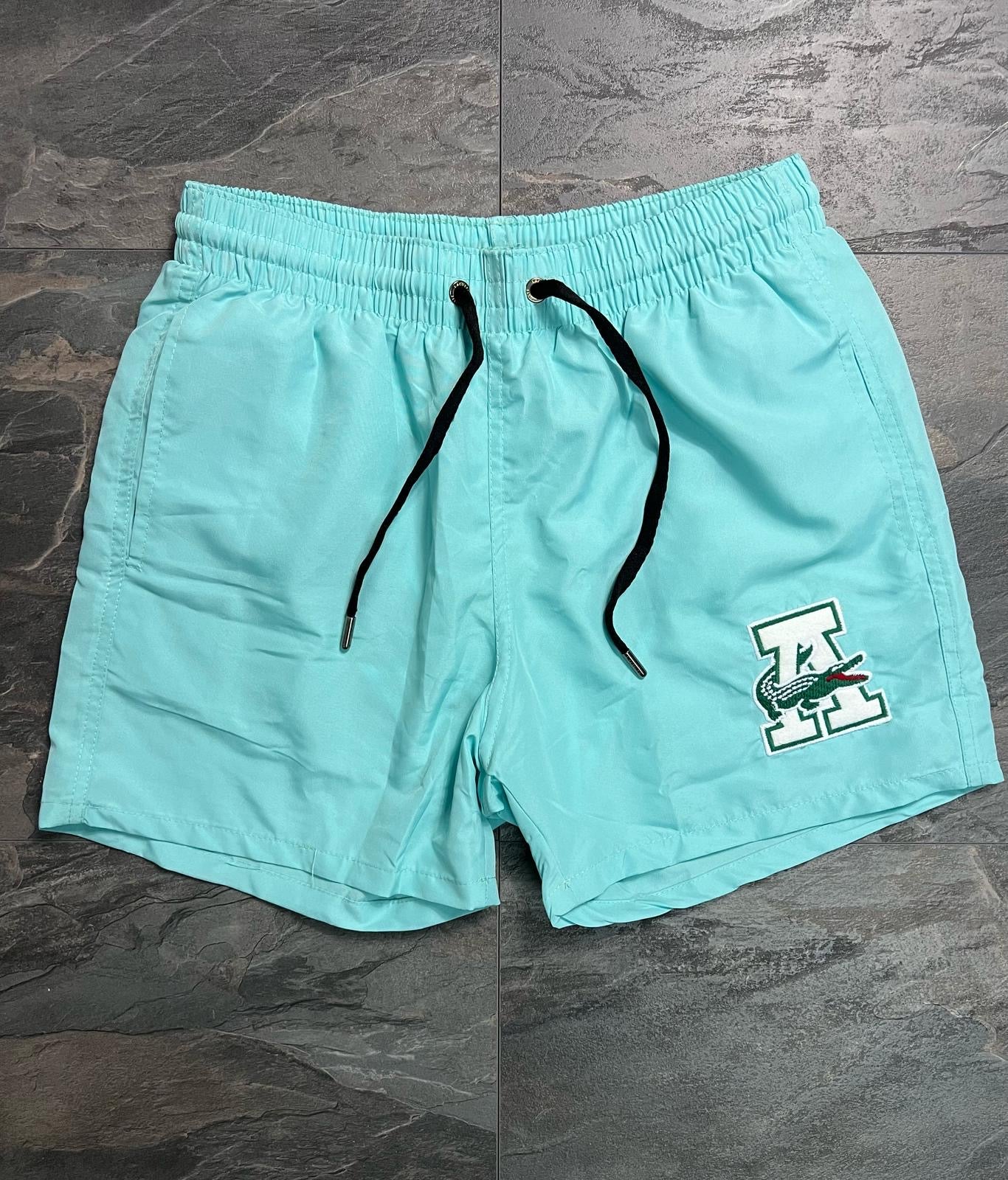 Шорти Lacoste
