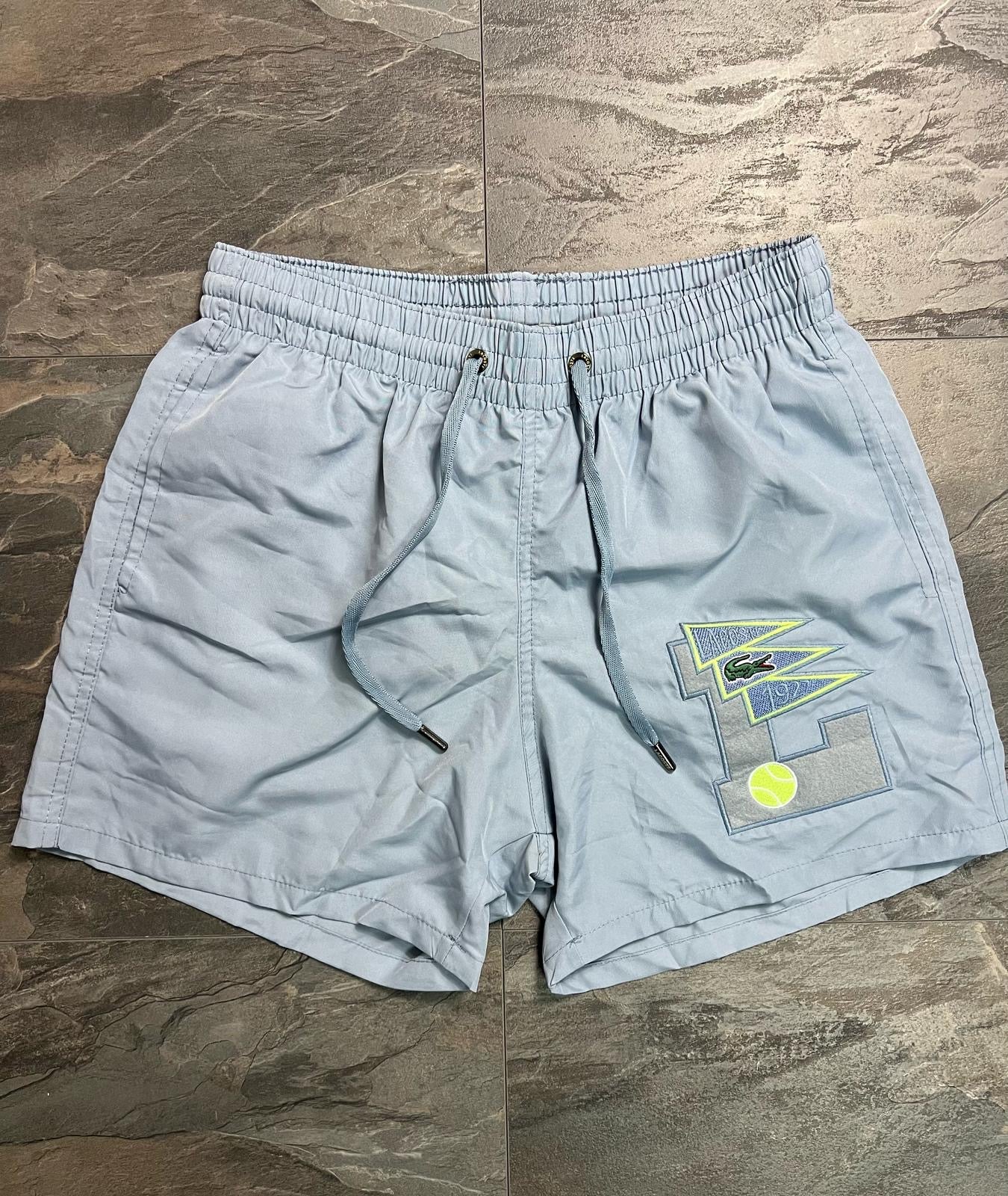 Шорти Lacoste
